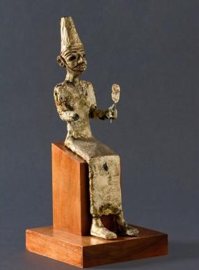 Seated statue of El